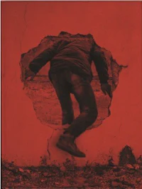 an image of a man jumping out of a hole in the wall